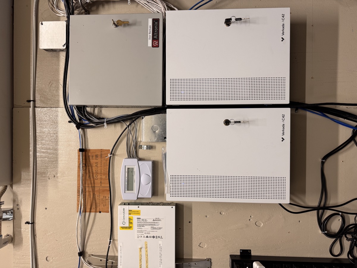 Enclosed Verkada AC42 access control panels and organized wiring after the IETEL deployment.